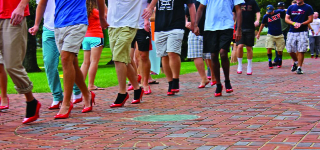 Various Centre men participate in the annual IFC and PHC sponsored Walk-a-mile event to raise awareness for power-based violence