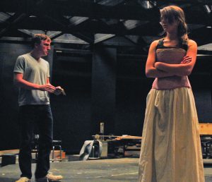 Seniors Steven Maddox and Olivia Palmer run lines with each other during a scene, with Palmer wearing a rough version of her costume to channel her characters Mary and Faddy